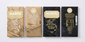 Packaging dal design ispirato a mappe e cartine geografiche per viaggi senza tempo