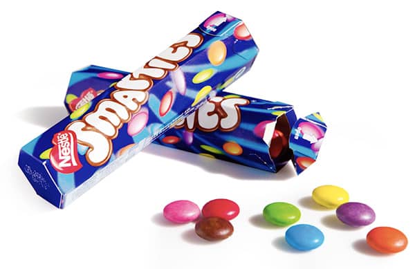 A cardboard slim tuck end box for Smarties