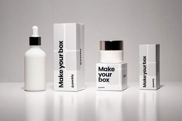 White boxes with black print for cosmetic products as an example of secondary packaging