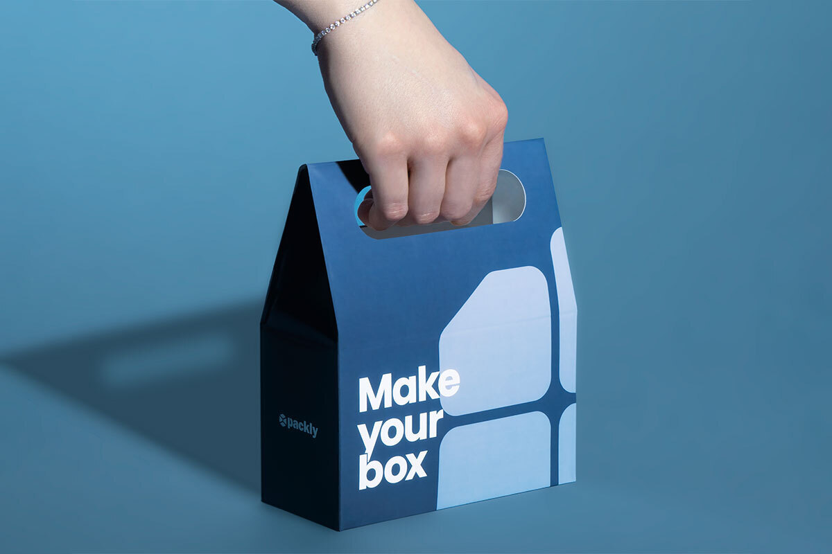 An example of Packly's packaging types: blue box with handle and white lettering